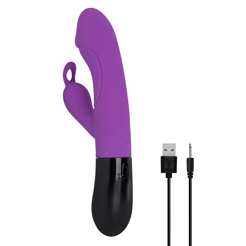 Vibrador Ares 2.0 junto a su cable de carga USB, destacando su funcionalidad recargable.